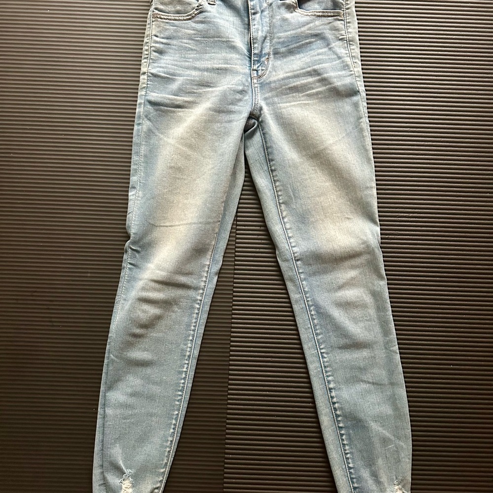 American Eagle Cropped Frayed Light Blue Jeans